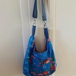 Speels blauw met verstelbare riem