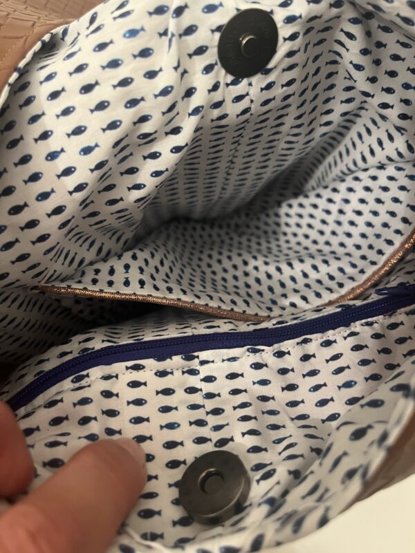 Bruine shopper gevlochten look